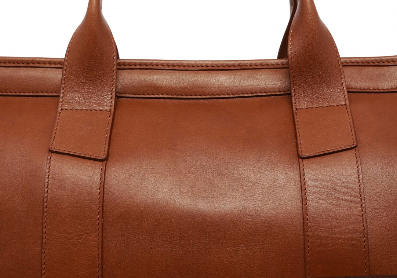 mens-leather-duffle-bag-cognac-leather-closeup